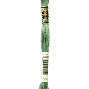 May include: A skein of DMC embroidery floss in color 320, a light green shade. The floss is wound on a cardboard spool with a gold label that reads "DMC" and "25" and has a barcode.