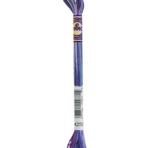May include: A skein of DMC embroidery floss in shades of purple and blue. The floss is labeled with the number 4250. The DMC logo is visible on the label. The floss is tightly wound at both ends.
