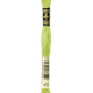 May include: A skein of DMC embroidery floss in color 472, a light green shade. The floss is wound on a white card with black text that reads "DMC 25 8.7 yds 3 m".