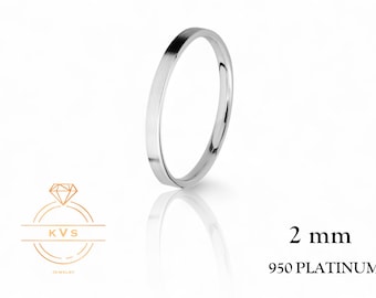 May include: A simple, 2 mm wide platinum wedding band. The band is made of 950 platinum.