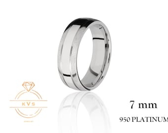 May include: A 7 mm wide platinum wedding band with a brushed finish and a polished centre stripe.