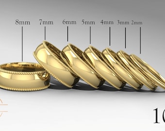 May include: A set of seven gold wedding bands in different widths, ranging from 2mm to 8mm. The bands are all 10K gold and have a beaded edge.