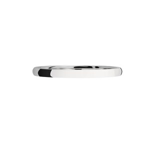 May include: A simple, silver wedding band with a smooth, polished finish.
