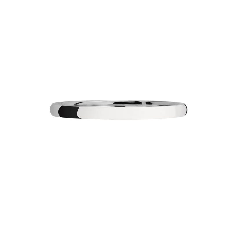 May include: A simple, silver wedding band with a smooth, polished finish.