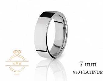 May include: A 7 mm wide platinum wedding band. The band is made of 950 platinum.