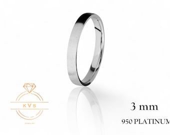 May include: A simple, polished platinum wedding band with a 3 mm width. 950 Platinum.