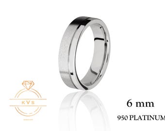 May include: A 6 mm wide platinum wedding band with a brushed finish and a polished edge. 950 PLATINUM.