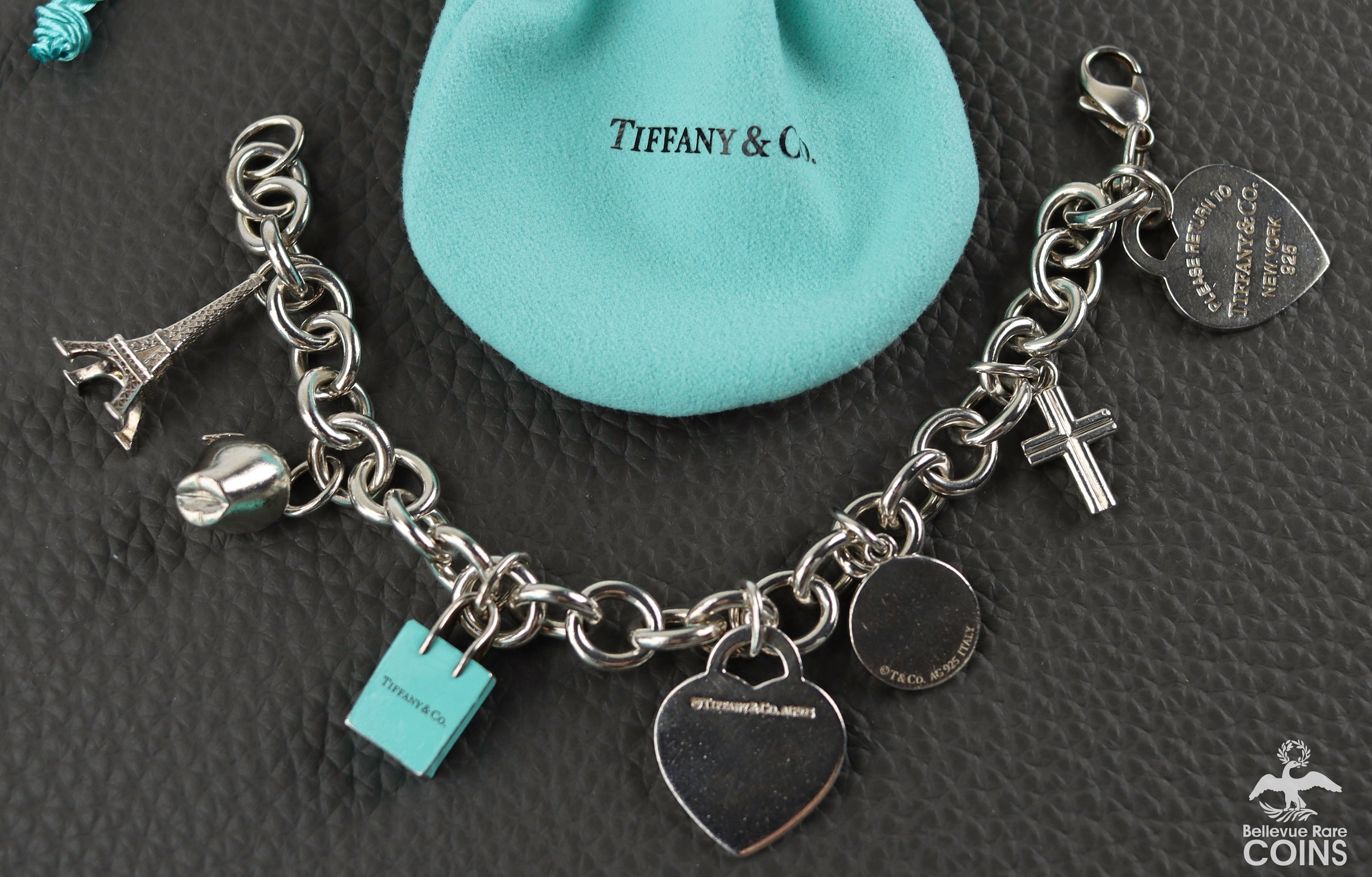 Mom heart tag charm in sterling silver on a link clasp bracelet  Tiffany   Co