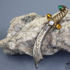 Broche vintage de espada cimitarra en plata de ley (0,925) en tono dorado con diamantes de imitación
