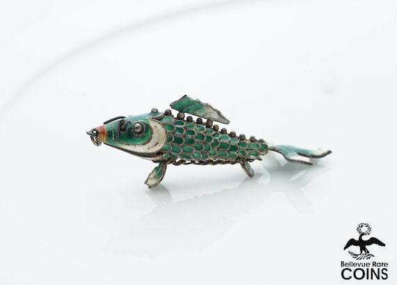 Silver articulated fish best sale pendant