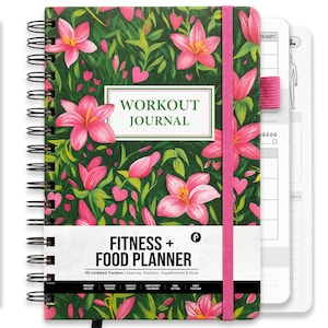 May include: A spiral-bound workout journal with a dark green cover featuring pink lilies and small hearts. The cover displays the text WORKOUT JOURNAL and FITNESS + FOOD PLANNER. A pink elastic band secures the planner, which includes 90 undated trackers.
