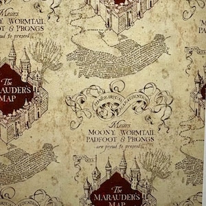 May include: A detailed map design with a vintage aesthetic. The map features castle illustrations, scrollwork, and text including "The Marauders Map" and "Hogwarts". The color palette includes beige, brown, and burgundy.