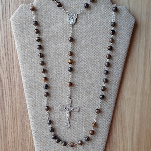 Rosary with Tiger Eye stone beads, detailed Crucifix and Our Lady of Grace center piece