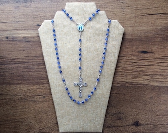 Rosary with blue diamond cut glass beads, Our Lady of Grace centerpiece and detailed Crucifix