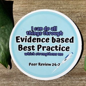 May include: A round sticker with a light blue background and white border. The sticker features a quote about evidence-based best practice, with the text "I can do all things through Evidence based Best Practice which strengthens me Peer Review 24-7". A pipette is shown in the bottom right corner.