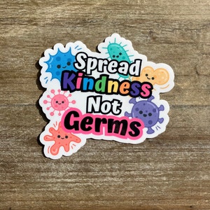 May include: A white sticker with colorful cartoon germs and the text "Spread Kindness Not Germs".
