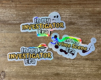May include: Three iridescent holographic stickers with the text "In my Investigator Era" and a skull graphic, "In my Crime Scene Era" with blood splatter, and "In my Investigator Era" with a detective hat graphic.