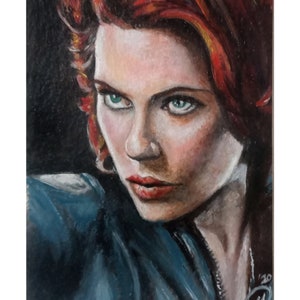 May include: A close-up portrait painting of a woman with red hair, green eyes, and red lips. She is wearing a blue shirt and looking directly at the viewer.