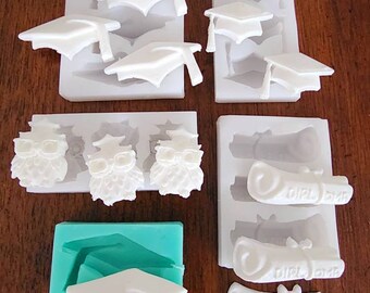 May include: A collection of silicone molds for crafting graduation-themed decorations. The molds include mortarboards, owls wearing glasses, and rolled diplomas. The molds are white and teal, perfect for creating custom cake toppers or embellishments.
