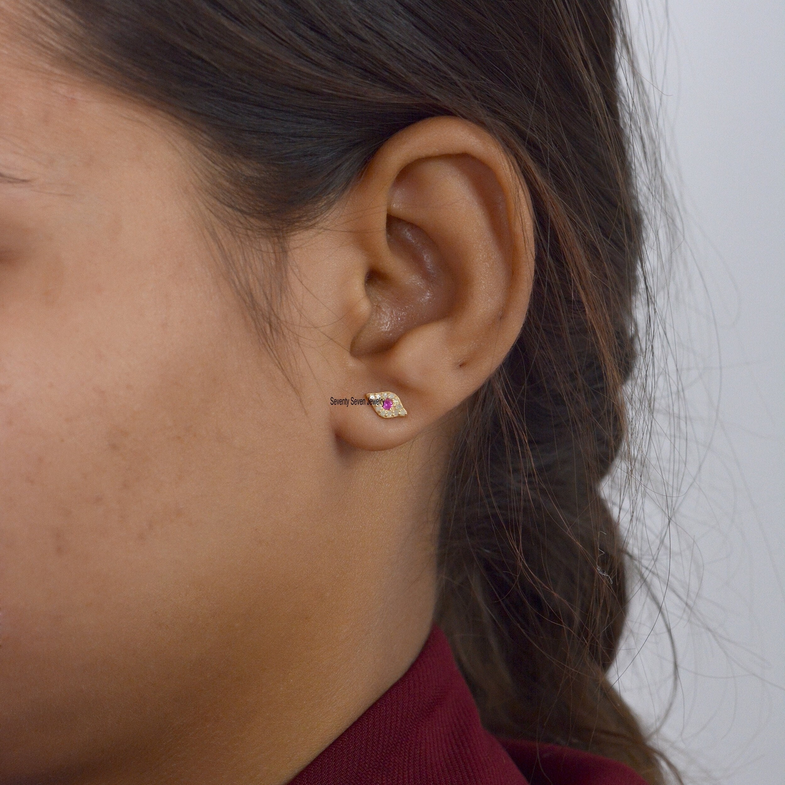 14k Gold Evil Eye Studs: Ruby & Diamond Goodluck Jewelry - Seventy Seven Jewelry | SKU: SSMJE310-14KYGDIRU-2026 14k Gold Evil Eye Studs: Ruby & Diamond Goodluck Jewelry - Seventy Seven Jewelry | SKU: SSMJE310-14KYGDIRU-2026