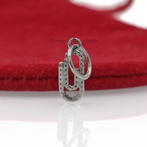 Candado con clip de oro de 9 quilates: conector ovalado
