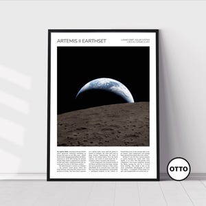 May include: A framed print titled "Artemis II Earthset" showing Earth rising over the Moon's surface. The Earth is a blue and white sphere against a black background. The print includes text and a circular logo.