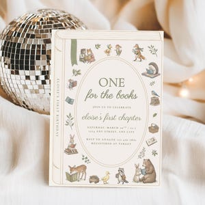 May include: A rectangular birthday invitation card featuring a book-themed border with illustrations of woodland animals reading. The text reads ONE for the books, eloise's first chapter, and includes event details, date, time, and RSVP information.