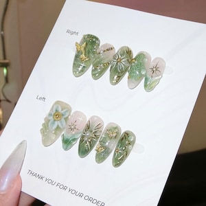 Handmade Green Fairycore Press On Nails | 3D Flowers, Gold Stars & Glittered Petals On Olive Marble Base | Almond Nails For Enchanted Garden