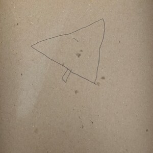 May include: A simple black line drawing of a triangle with a line extending from the bottom point, resembling a Christmas tree.