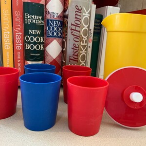 Vintage Tupperware Push-Seal Pitcher-Yellow  and red with 5 tumblers