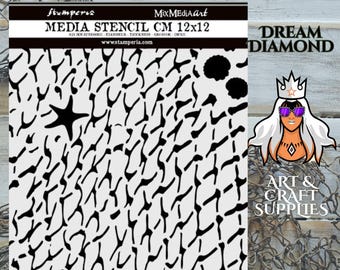 May include: A white stencil with a black pattern and the text "MEDIA STENCIL CM 12x12". The stencil measures approximately 12 x 12 cm. The image also includes the text "DREAM DIAMOND" and "ART & CRAFT SUPPLIES".