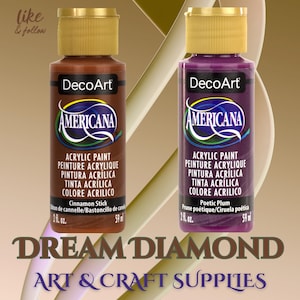 May include: Two DecoArt Americana acrylic paint bottles. One is cinnamon stick, the other is poetic plum. Each bottle is 2 fl oz. The bottles are labeled with the text "Dream Diamond Art & Craft Supplies."