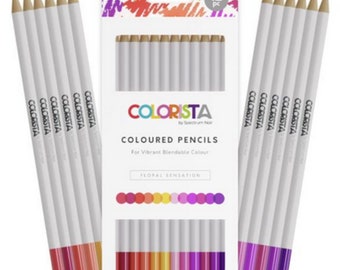 May include: A package of 12 colored pencils with white barrels and colored tips. The pencils are labeled "COLORISTA" and the package reads "COLOURED PENCILS" and "FLORAL SENSATION". The pencils have a range of colors.