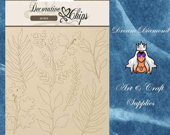 May include: A sheet of decorative chipboard with 14x14 cm measurements featuring a variety of leaf and branch designs. The sheet is beige with brown outlines of the designs. The text "Decorative Chips" is at the top of the sheet. The text "Dream Diamond Art & Craft Supplies" is on the right side of the sheet.