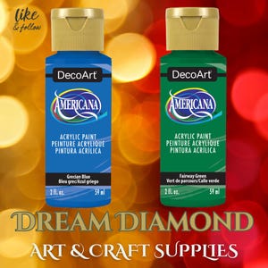 May include: Two bottles of DecoArt Americana acrylic paint. One is Grecian Blue, the other is Fairway Green. Each bottle is 2 fl. oz. and 59 ml. The bottles have gold caps and white labels with the brand name and paint type.