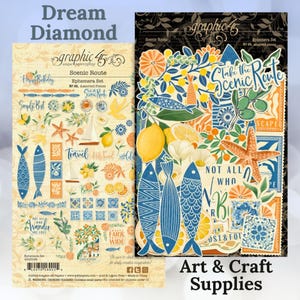 May include: Two packs of art and craft supplies featuring a travel theme. The packs include assorted paper ephemera with illustrations of fish, lemons, sailboats, and starfish. The text on the packs reads "Scenic Route" and "Happy Birthday."
