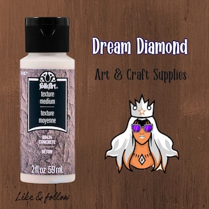 May include: A bottle of FolkArt texture medium in a concrete finish. The label includes the text "texture medium" and "60424 CONCRETE". The bottle is 2 fl oz (59ml). The image also includes the text "Dream Diamond Art & Craft Supplies".
