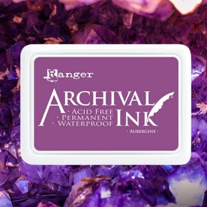May include: Aubergine Archival Ink pad by Ranger. Acid free, permanent, and waterproof ink pad.