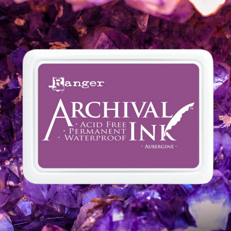 May include: Aubergine Archival Ink pad by Ranger. Acid free, permanent, and waterproof ink pad.