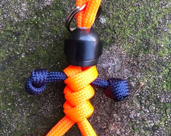 The original Biker buddy paracord buddy F1 Honda Repsol colours to suit your bike Made with 550 paracord This will not scratch your tank