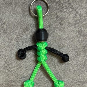 The original Biker buddy paracord buddy Kawasaki Monster colours to suit your bike Made with 550 paracord This will not scratch your tank