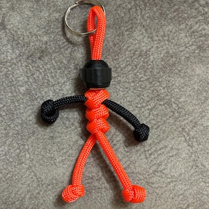 The original Biker buddy paracord buddy KTM Harley colours to suit your bike Made with 550 paracord This will not scratch your tank