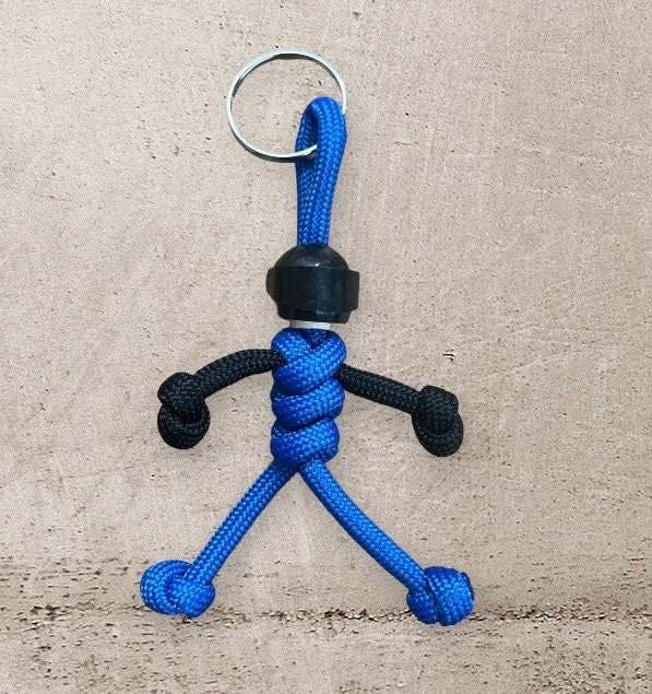 Silberfarbener Stickman-Mittelfinger-Schlüsselanhänger – Cadeau