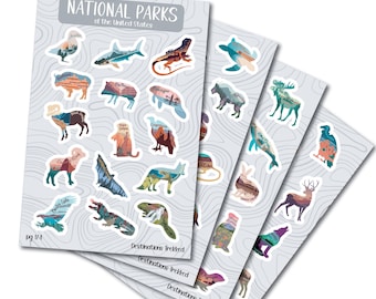 May include: Four sheets of stickers featuring illustrations of national parks in the United States. Each sticker features a different animal or landscape, with the name of the park printed on each sticker. The stickers are arranged in a stack, with the top sheet showing the text "National Parks of the United States" and "pg 1/4".