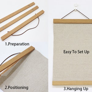 Op de afbeelding: Drie houten staven met magneten aan de uiteinden worden gebruikt om een ​​canvasprint op te hangen. Het canvas hangt aan een muur met een haak. De afbeelding toont drie stappen: voorbereiding, positionering en ophangen. De tekst "Easy To Set Up" is zichtbaar op het canvas.