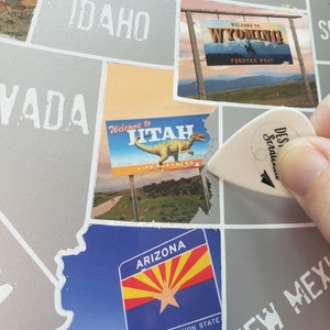 State Border signs scratch off map; State Welcome signs of United States travel poster; Road trip bucket list checkoff