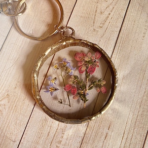 Stained glass keychain with real pressed flower heather and forget me not silver patina