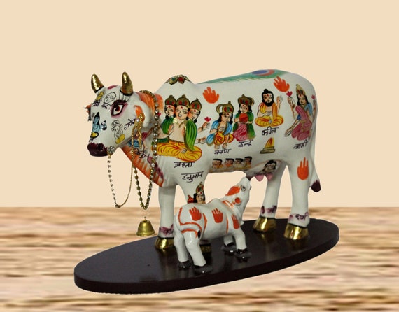 Buy Cow Statue, Kamdhenu Cow With Calf Statue Spiritual Showpiece Figurine,  Painted Cow Statue for Home Decor, Housewarming, Gift Decor & Vastu Online  in India 