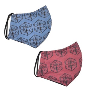 May include: Two face masks with a repeating pattern of black dice with a sword inside and the text "Critical Role" on a blue and red background.