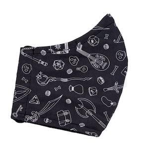 May include: Black face mask with a white pattern of dice, swords, a lute, and other fantasy role-playing game symbols.